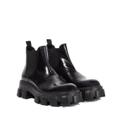 Prada Monolith Leather Ankle Boots